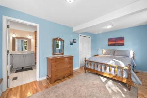Ένα ή περισσότερα κρεβάτια σε δωμάτιο στο Brookside Bungalow