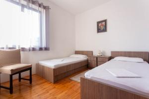 Postel nebo postele na pokoji v ubytování House Milka
