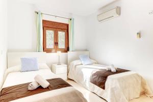 Posteľ alebo postele v izbe v ubytovaní Villa Casa de Pedra by Villa Plus