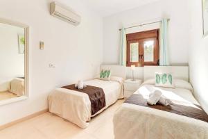 Posteľ alebo postele v izbe v ubytovaní Villa Casa de Pedra by Villa Plus