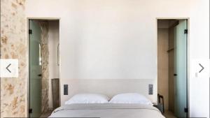 Postel nebo postele na pokoji v ubytování Holidays in Chania Hotel
