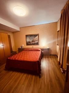 Postel nebo postele na pokoji v ubytování Hotel Al Sole