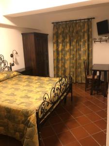 Posteľ alebo postele v izbe v ubytovaní Hotel Bucaneve
