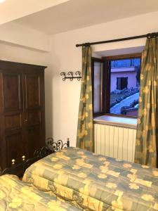 Posteľ alebo postele v izbe v ubytovaní Hotel Bucaneve