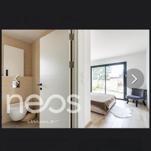 a bedroom with a bed and a sliding glass door at Maison in Belleneuve