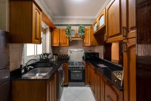 Η κουζίνα ή μικρή κουζίνα στο 1832 Haven Residence - 2br - Central