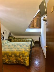 Posteľ alebo postele v izbe v ubytovaní Hotel Bucaneve