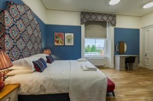 Postel nebo postele na pokoji v ubytování 8QR Rooms