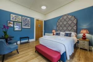 Postel nebo postele na pokoji v ubytování 8QR Rooms