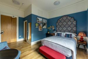 Postel nebo postele na pokoji v ubytování 8QR Rooms