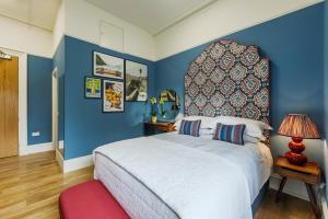 Postel nebo postele na pokoji v ubytování 8QR Rooms
