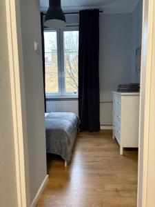 Postel nebo postele na pokoji v ubytování Apartament Stare Miasto Comfort