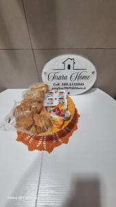 a plate of food sitting on top of a table at Tisara home in Portici