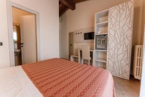 TV a/nebo společenská místnost v ubytování Hotel Eden Salò + 37 fotografií