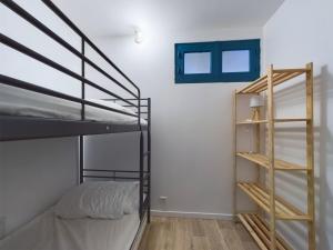 Posteľ alebo postele v izbe v ubytovaní À 200m de la plage, appartement pour 4