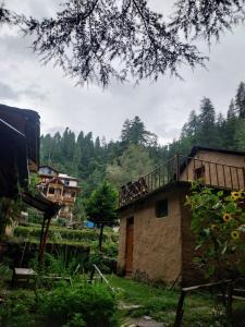 Mud House by Hostalgic室外花園