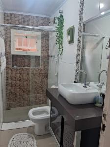 Ένα μπάνιο στο Dexa Hospedagem