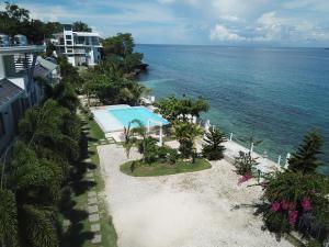 an aerial view of a resort and the ocean at Seascape Beach Resort Oslob in Oslob