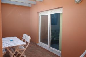 Balkón alebo terasa v ubytovaní Livingtarifa Apartamento Simba + 4 fotografie