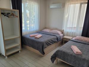 Ein Bett oder Betten in einem Zimmer der Unterkunft Cetin Pansiyon