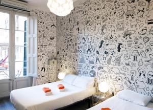 Postel nebo postele na pokoji v ubytování ZOOROOMS Boutique Guesthouse
