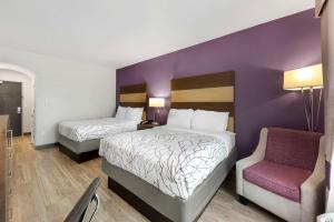 Postel nebo postele na pokoji v ubytování Best Western Plus Buda Austin Inn & Suites