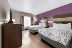 Postel nebo postele na pokoji v ubytování Best Western Plus Buda Austin Inn & Suites