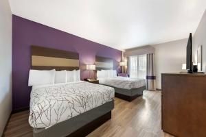 Postel nebo postele na pokoji v ubytování Best Western Plus Buda Austin Inn & Suites