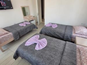 Ein Bett oder Betten in einem Zimmer der Unterkunft Cetin Pansiyon