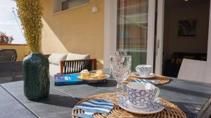 Фотография из галереи Al 33 - Luxury Apartment в Альгеро +18 фотографий