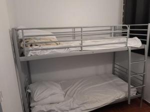 Ένα ή περισσότερα κρεβάτια σε δωμάτιο στο Appartement 3 ch proche Lydia