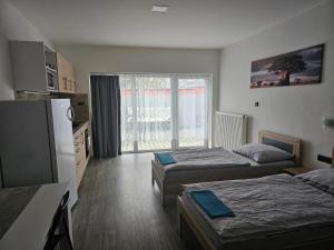 Postel nebo postele na pokoji v ubytování Penzion Machynka
