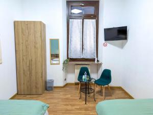 TV a/nebo společenská místnost v ubytování Home4you