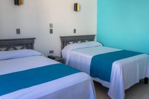 Postel nebo postele na pokoji v ubytování Hacienda de Castilla + 37 fotografií
