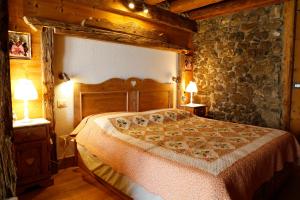 Postel nebo postele na pokoji v ubytování Albergo Diffuso Zoncolan
