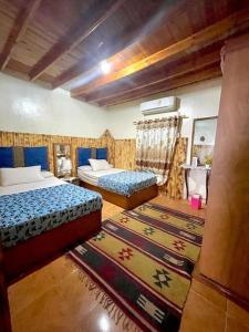 Ένα ή περισσότερα κρεβάτια σε δωμάτιο στο Cozy Retreat in Dahab-Stay&Chill +19 φωτογραφίες