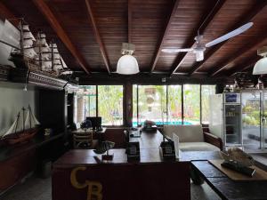 a living room with a couch and a table at Hotel Boutique Casa Berastegui in Puerto Colombia