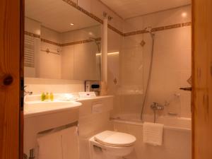 Koupelna v ubytování Hotel Europa Suites St Moritz