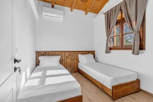 Postel nebo postele na pokoji v ubytování Vila Era
