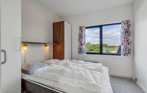 Ένα ή περισσότερα κρεβάτια σε δωμάτιο στο Fanø Bad, Lejl 72