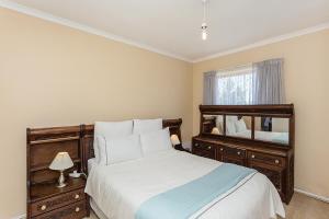 Ένα ή περισσότερα κρεβάτια σε δωμάτιο στο Secured 3-Bedroom Townhouse