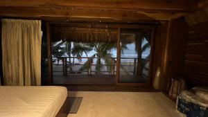 Ένα ή περισσότερα κρεβάτια σε δωμάτιο στο Hábitat Nandá