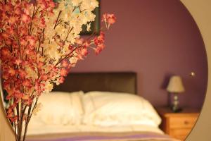Voodi või voodid majutusasutuse Sneem River Lodge Bed & Breakfast toas