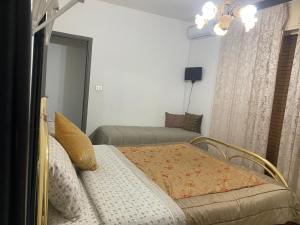 Postel nebo postele na pokoji v ubytování Il terrazzo dei nonni