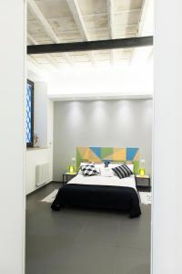 Ένα ή περισσότερα κρεβάτια σε δωμάτιο στο Casa Brunetti