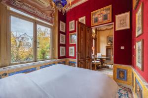 Postel nebo postele na pokoji v ubytování Park Mansion Hotel