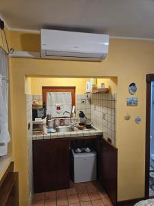 Kuchyň nebo kuchyňský kout v ubytování Sassi's Loft