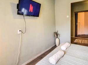 Televízia a/alebo spoločenská miestnosť v ubytovaní Mi Casa Vendégház - Apartments