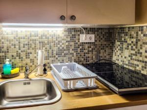 Kuchyňa alebo kuchynka v ubytovaní Mi Casa Vendégház - Apartments