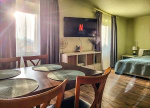 Posteľ alebo postele v izbe v ubytovaní Mi Casa Vendégház - Apartments